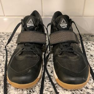 Reebok Transition LFT Cross Trainer  
CrossFit black tennis shoes. Size 9.5